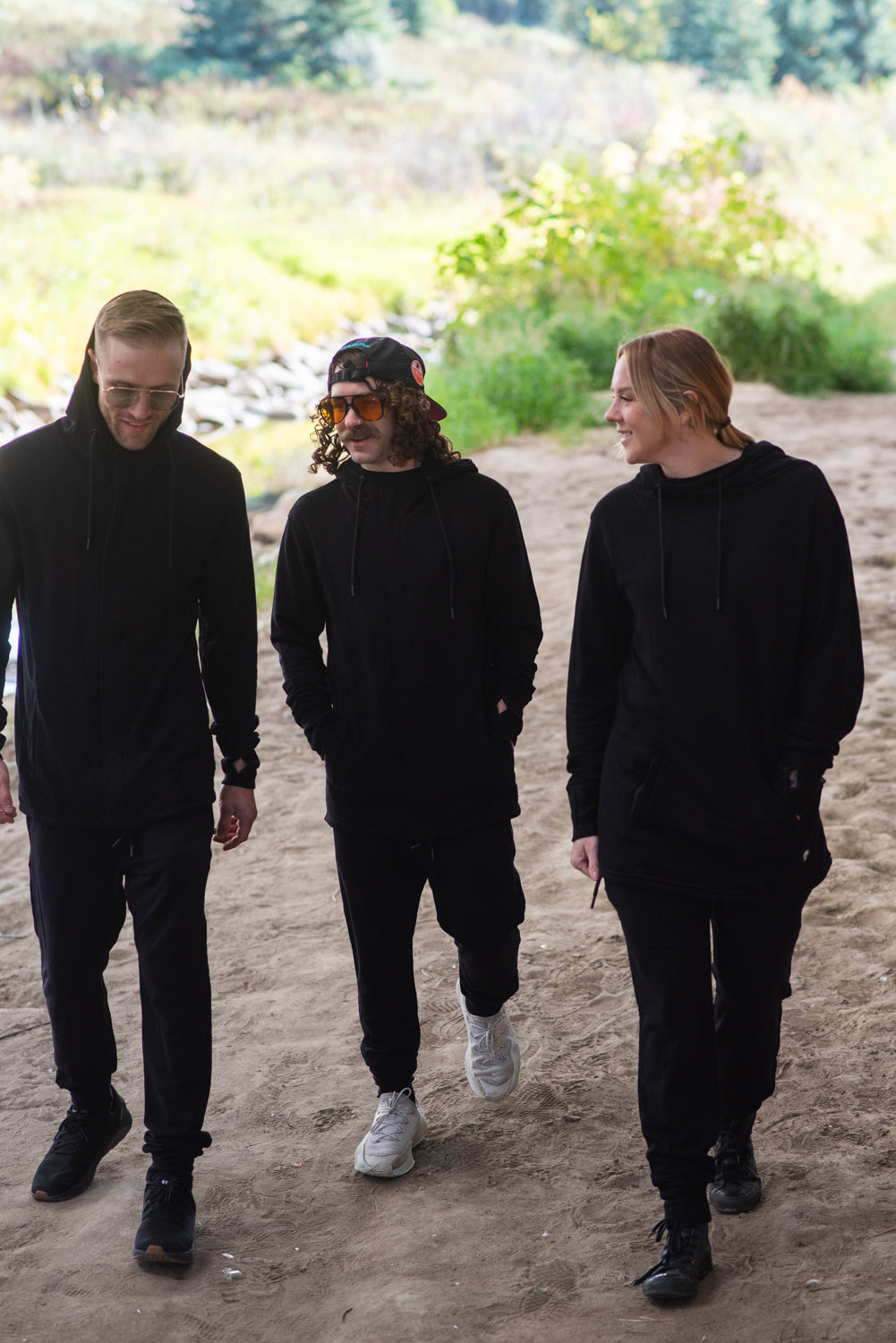 three friends walking in black Berneez bamboo fleece hoodies and joggers